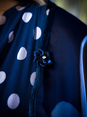 Navy Blue Sheer Detachable Sleeves with matching fasteners.