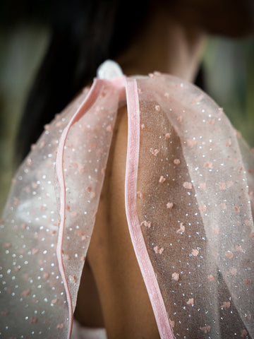 pink sheer dotted attachable sleeves with Butterfly attachments.