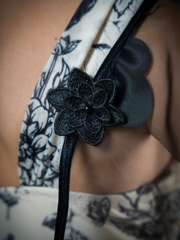 Black Floral Sheer Attachable Sleeves with fasteners.