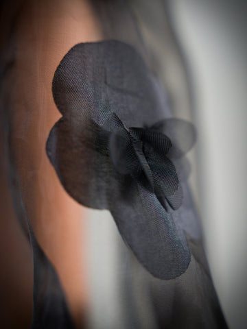 Black Floral Sheer Attachable Sleeves with fasteners.