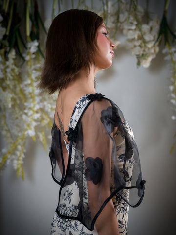 Black Floral Sheer Attachable Sleeves with fasteners.