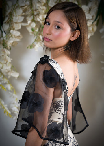 Black Floral Sheer Attachable Sleeves with fasteners.